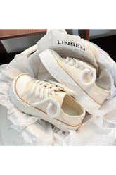 Chaussures à lacets roses